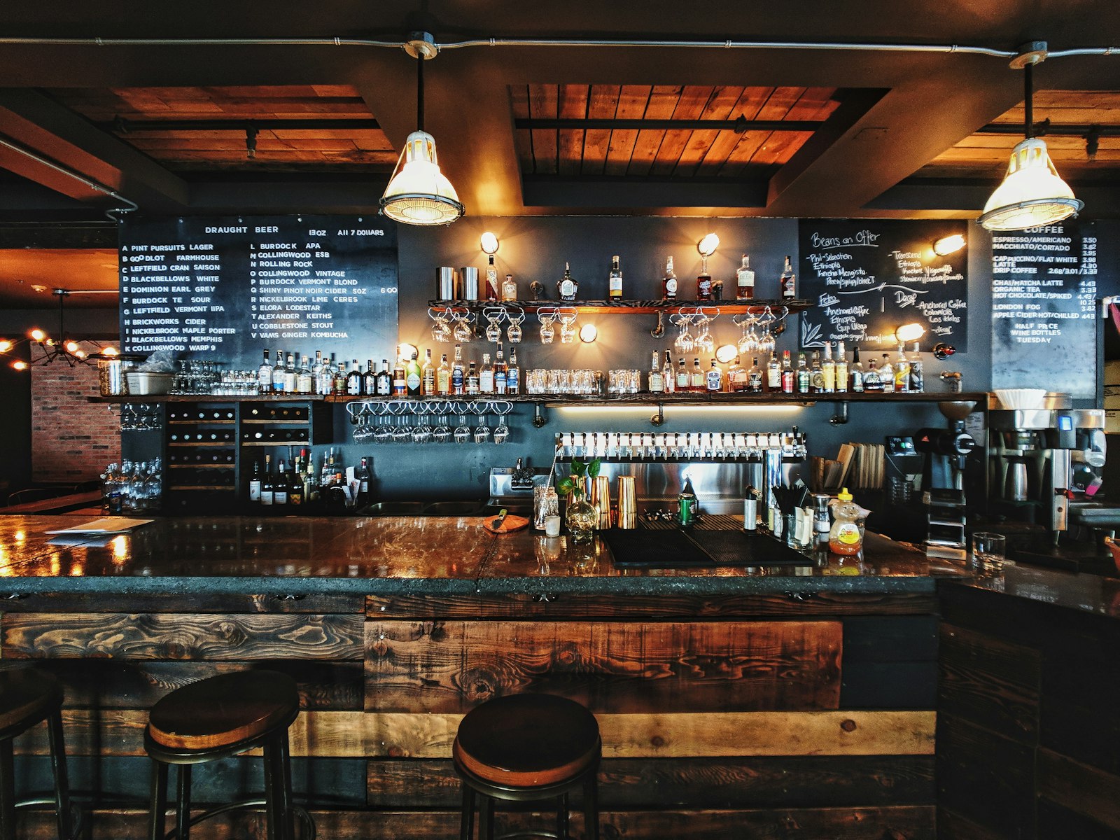 Classic neighborhood liquor store interior with shelves of wine, beer and spirits