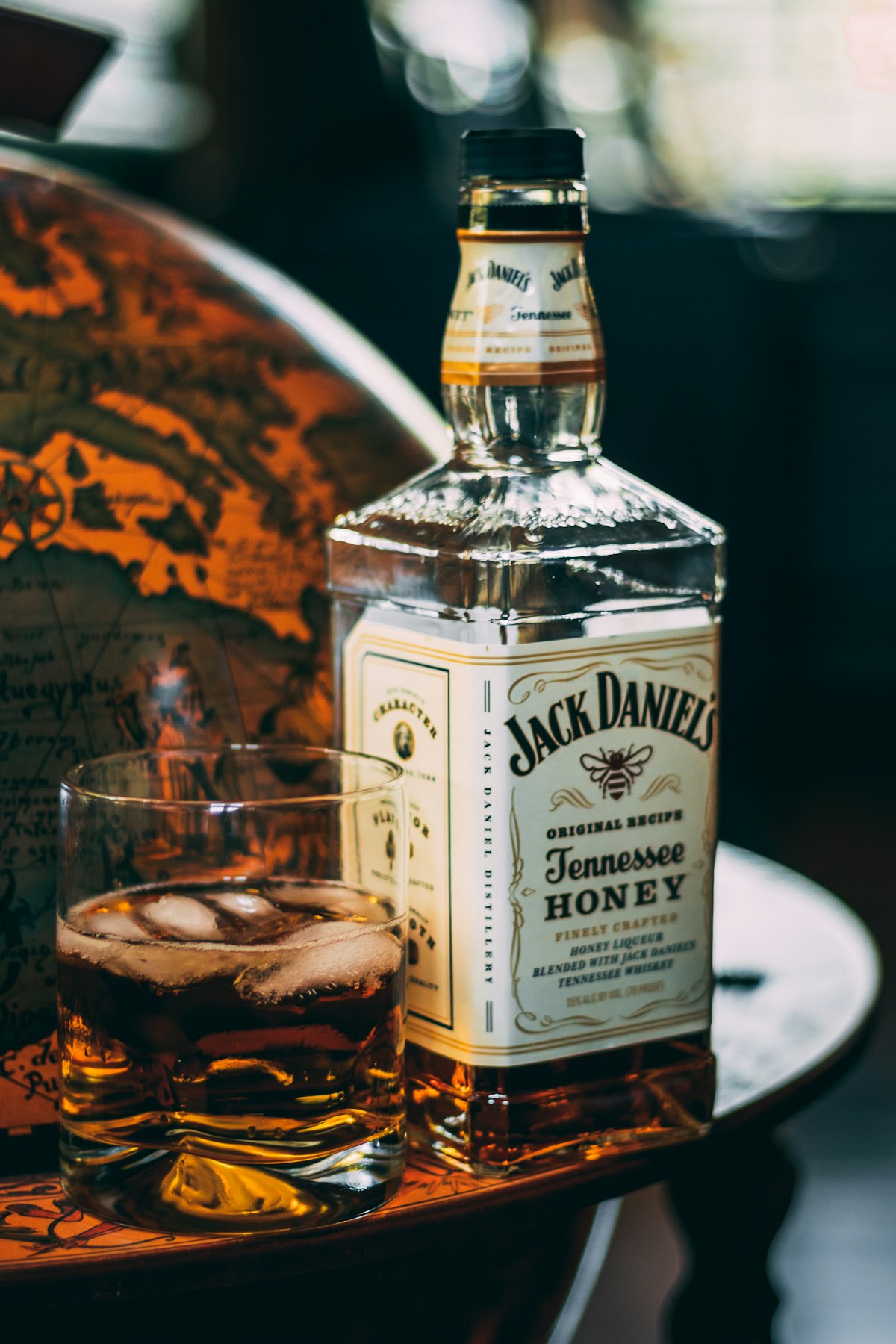 Whiskey and spirit bottles behind bar